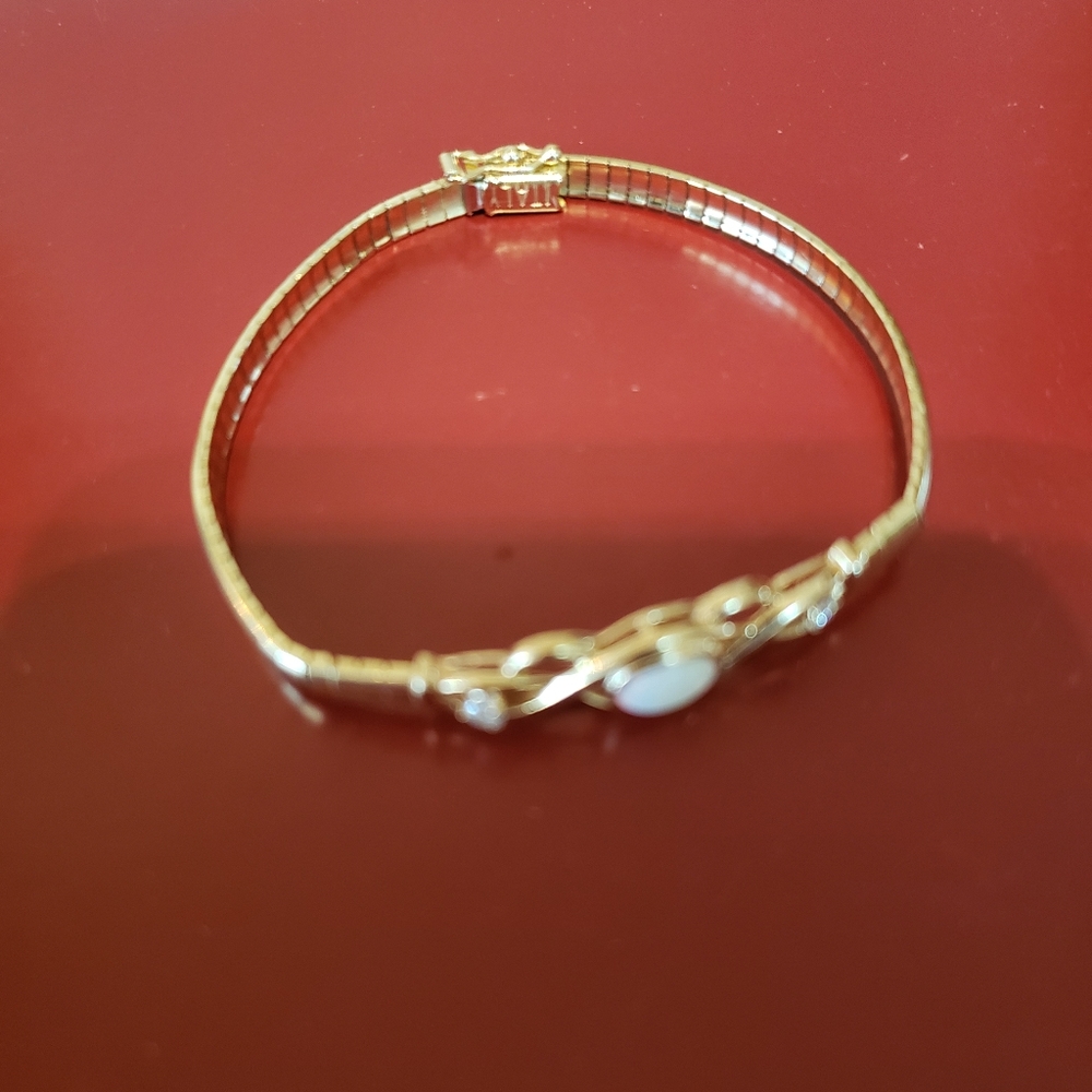 Beautiful real 14k YG cuff braclet.